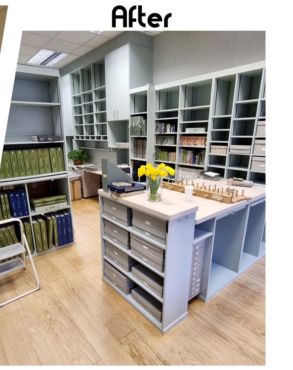 Built-in shelving and cabinetry repainted in a muted blue-grey finish.
